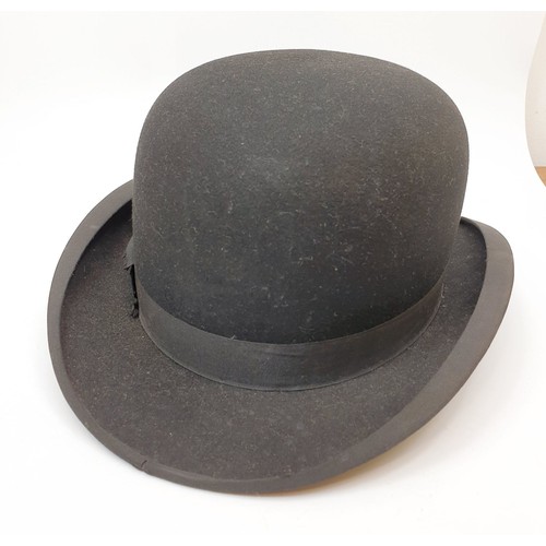 116 - A vintage bowler hat by Dunn & Co London. UK shipping £14.