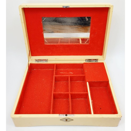 121 - Two vintage musical Japanese lacquered jewellery boxes, the widest 11