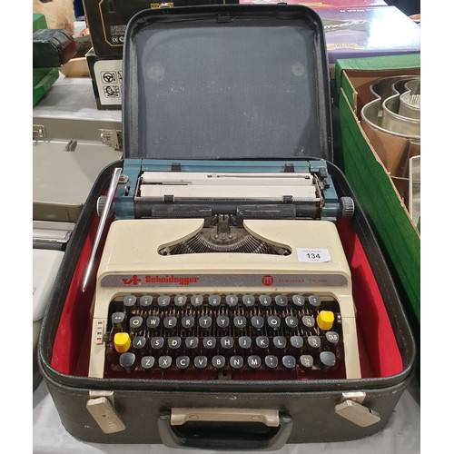 134 - A vintage Scheidegger Eurostar TM1000 typewriter with case. No shipping. Arrange collection or your ... 