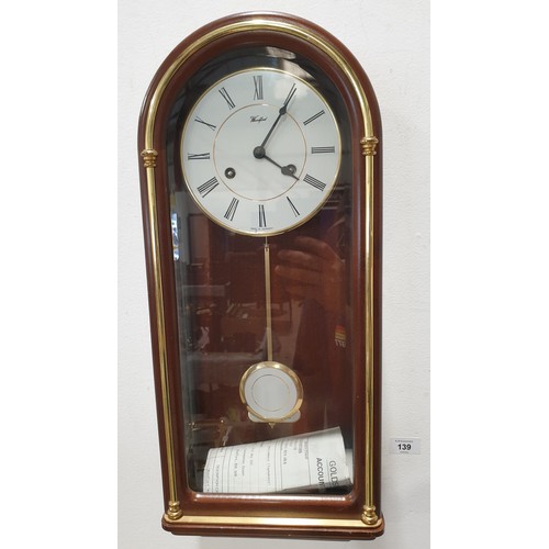 139 - A 1980s Woodford wall clock purchased by Woolcombers of Fairweather Green Bradford, height 20