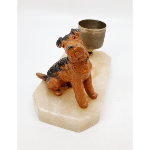 166 - A vintage ashtray with a spelter figure of a terrier and a silver plated match holder and striker, l... 