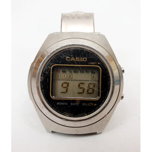 256 - A vintage Casio Casiotron R-16 digital watch. UK shipping £14.