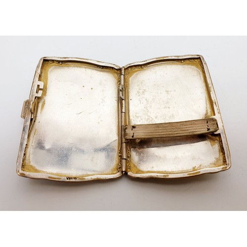 268 - A gilt white metal cigarette case, length 3.25