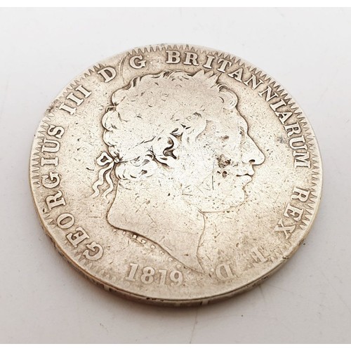 269 - A George III 1819 silver crown. UK shipping £14.