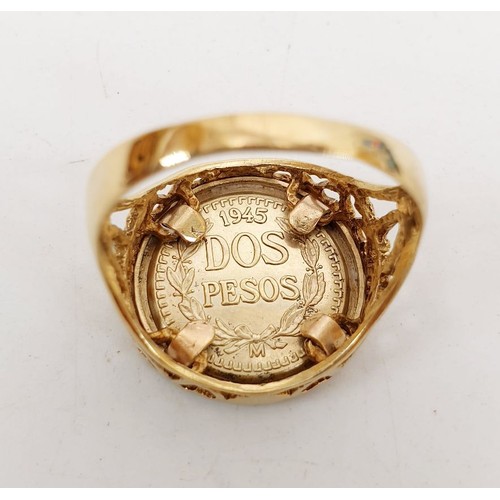 285 - A hallmarked 9ct gold ring with a faux coin, weight 4g, size U/V. UK shipping £14.