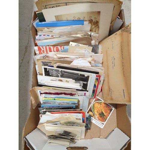 296 - A box of photographs, postcards and ephemera. UK shipping £14.