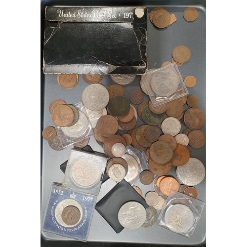 322 - A selection of British and foreign coinage including crowns and a 1977 United States proof set. UK s... 