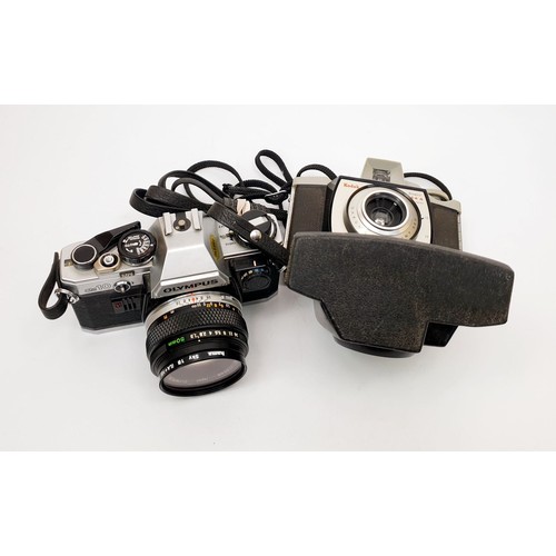 200 - An Olympus OM10 camera and a Kodak Brownie 44A camera. UK shipping £14.