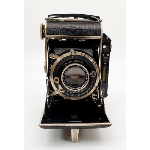 203 - A vintage Deckel Super Sport folding camera. UK shipping £14.