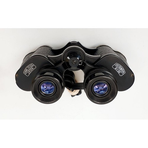 208 - A pair of Carl Zeiss 8x30 binoculars with case. UK shipping £14.