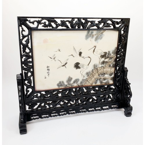 209 - A Chinese porcelain hand painted panel in a wooden frame and stand depicting storks in a tree and Th... 