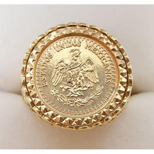 285 - A hallmarked 9ct gold ring with a faux coin, weight 4g, size U/V. UK shipping £14.