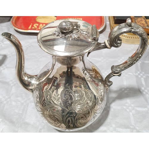 22 - A silver plated coffee pot. UK shipping £14.