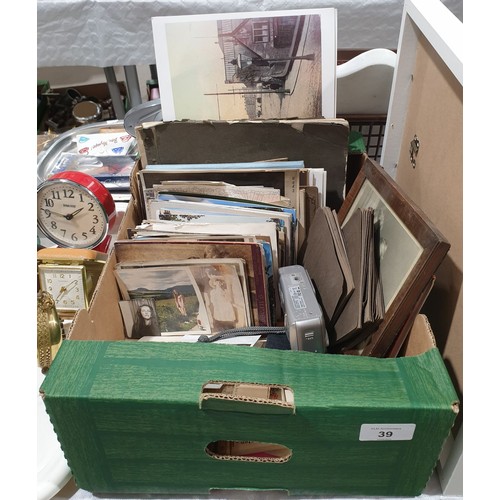 39 - A box of ephemera including vintage photographs of Russia, antique photographs and postcards. UK shi... 