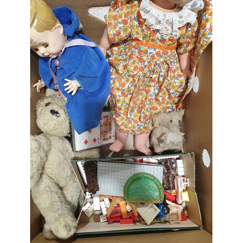 52 - A box including vintage dolls. UK shipping £14.