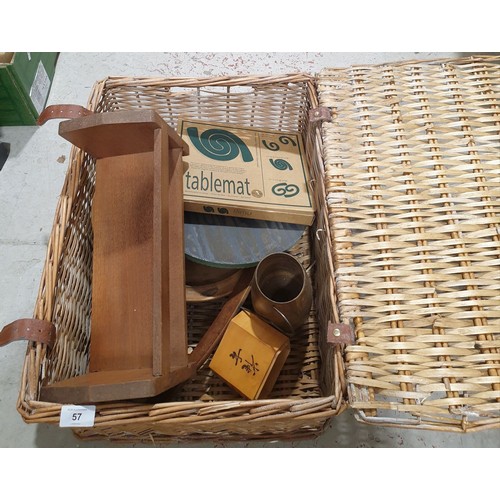 57 - A wicker basket containing treen. No shipping. Arrange collection or your own packer and shipper, pl... 