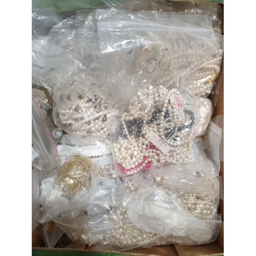 89 - A box of costume jewellery. No shipping.  Arrange collection or your own packer and shipper, please.