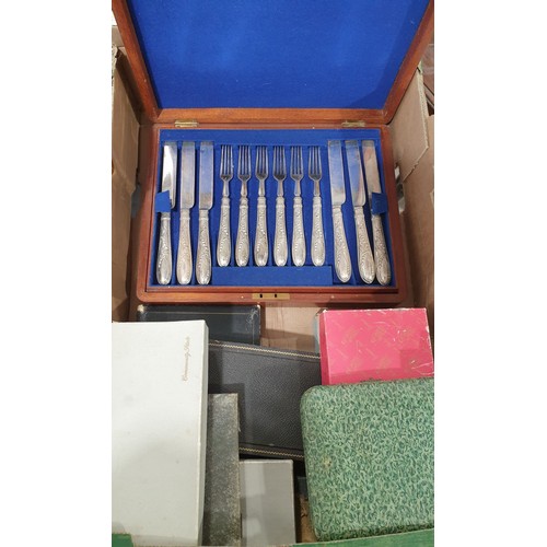 144 - A box of cased flatware. No shipping. Arrange collection or your own packer and shipper, please.