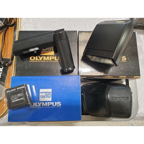 161 - An Olympus OM system winder 2 and electronic flash T32, Olympus OM10 case and manual winder. UK ship... 