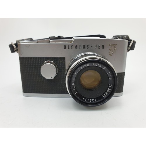 163 - A vintage Olympus Pen F camera. UK shipping £14.