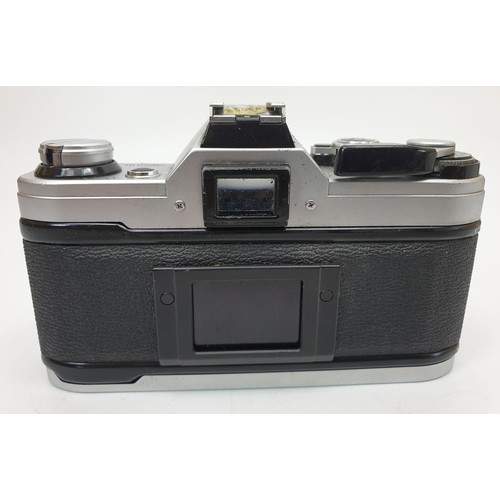 166 - A Canon AE-1 camera body. UK shipping £14.