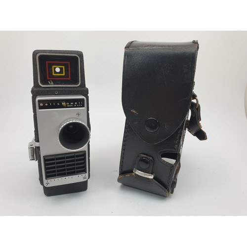 174 - A Bell & Howel cine camera. UK shipping £14.