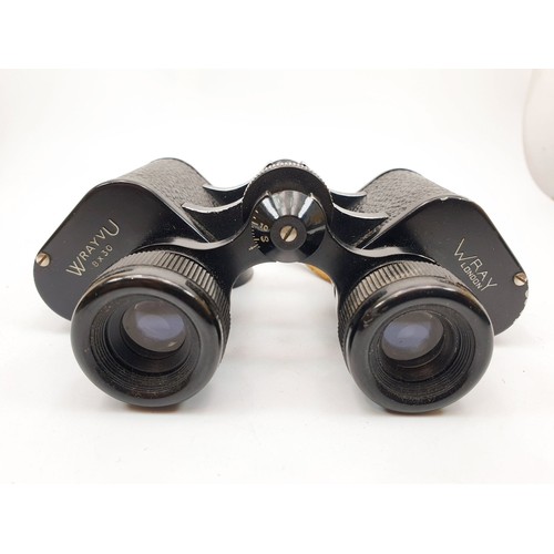 180 - A vintage boxed pair of Wray 8x30 binoculars. UK shipping £14.