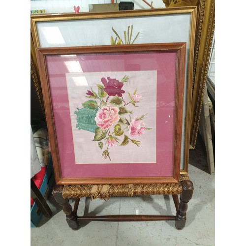 201 - A wall mirror, two needlework pictures and a footstool. No shipping. Arrange collection or your own ... 