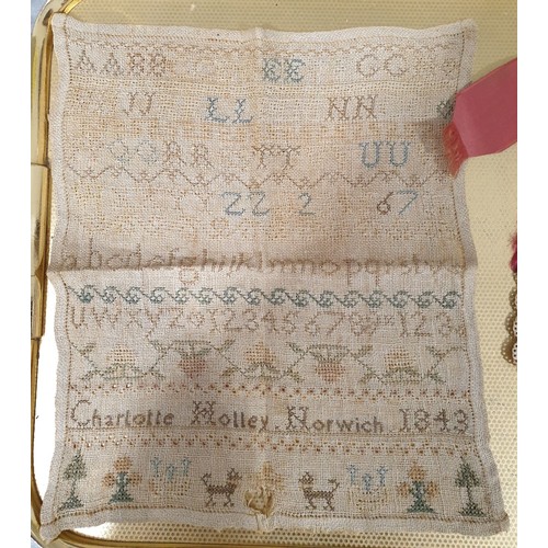 228 - An antique sampler by Charlotte Holly, Norwich, 1843, 12