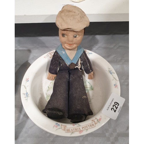 229 - A vintage sailor doll 