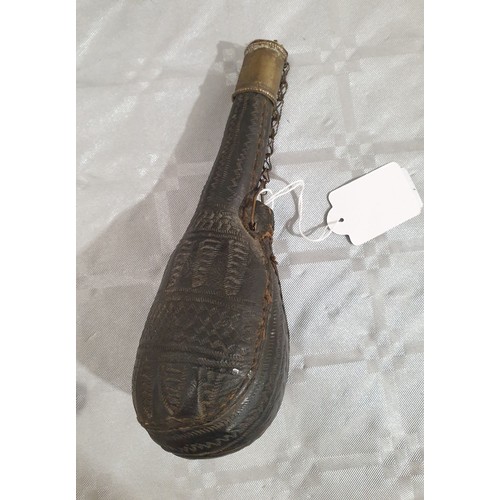 230 - An antique leather flask, length 7