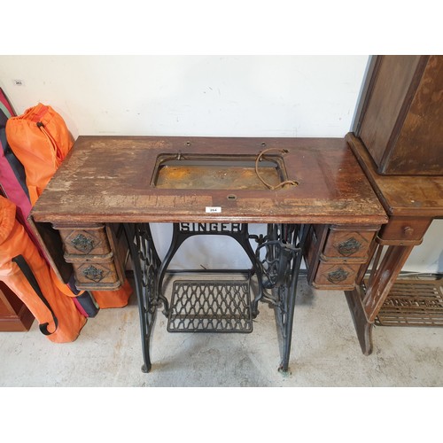 264 - An antique Singer sewing machine table. No shipping.  Arrange collection or your own packer and ship... 