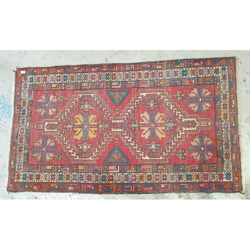 277 - An antique eastern rug, 67