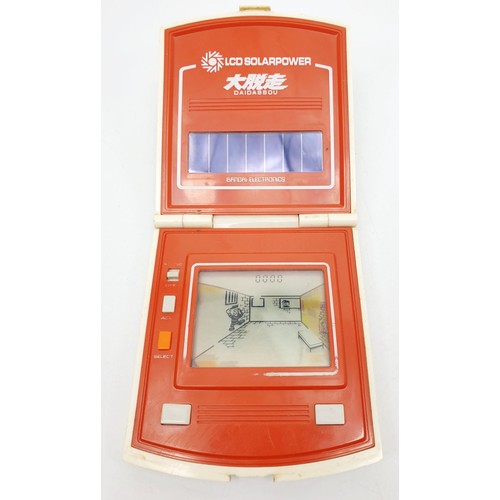 289 - A vintage Bandai Daidassou solar powered game, working order. UK shipping £14.