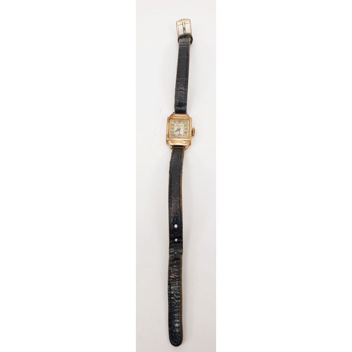 294 - A lady's 9ct gold cased wristwatch, case weight excluding movement and strap 2.5g. UK shipping £14.