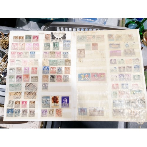 338 - A stamp album and first day covers. UK shipping £14.