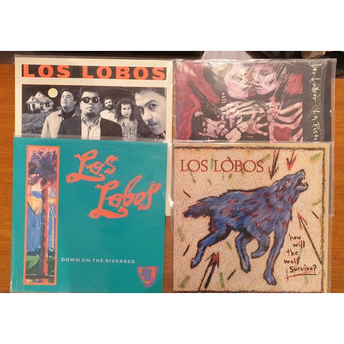 356 - Seven Los Lobos LPs and 12