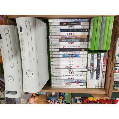 433 - Two Xbox 360 consoles and thirty four games. UK shipping £14.