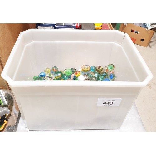 443 - A tub of marbles. UK shipping £14.