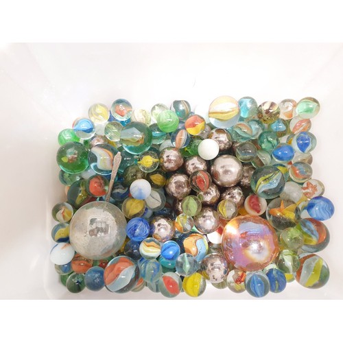 443 - A tub of marbles. UK shipping £14.