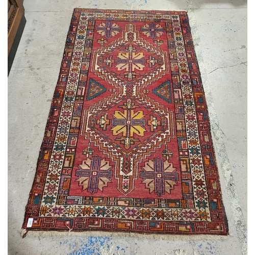 277 - An antique eastern rug, 67