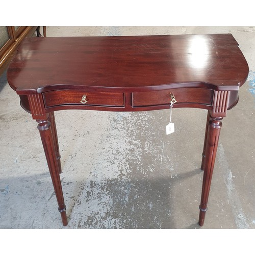 201 - A mahogany hall table with two drawers under, width 31.25