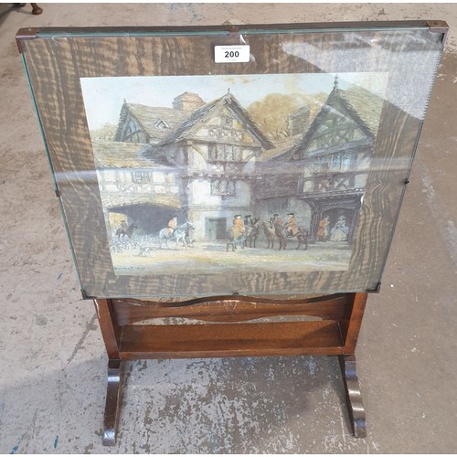 200 - A vintage folding fire screen/table, width 18