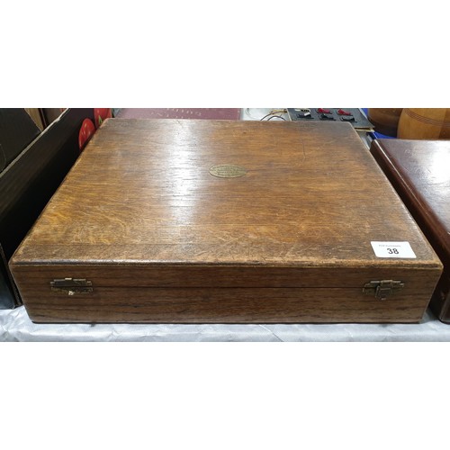 38 - A vintage oak cutlery box, width 15.75