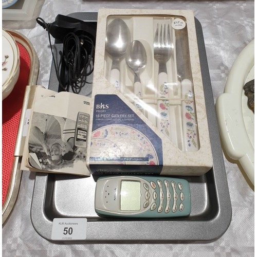 50 - A vintage boxed set of BHS cutlery together with a mobile phone. UK shipping £14.