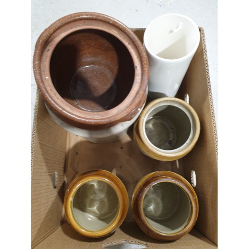 68 - A box including stoneware jars. No shipping. Arrange your own packer and shipper, please.