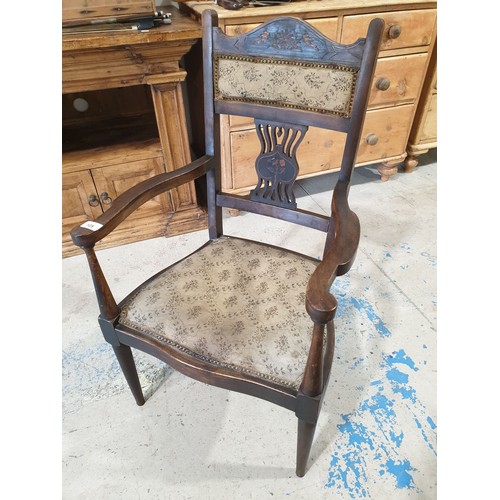 125 - An early 20th century armchair. No shipping. Arrange your own packer and shipper, please.