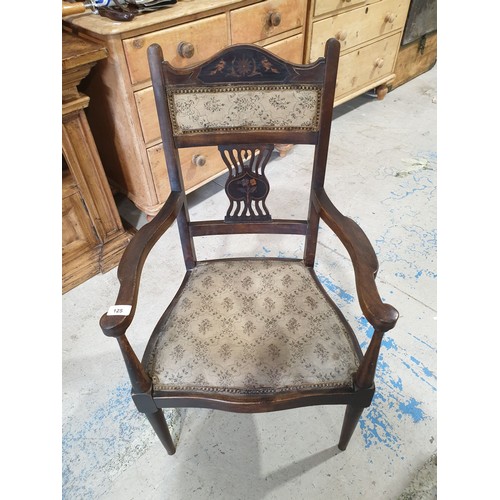 125 - An early 20th century armchair. No shipping. Arrange your own packer and shipper, please.