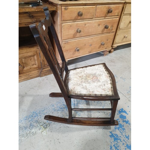 126 - An early 20th century oak rocking chair. No shipping. Arrange your own packer and shipper, please.