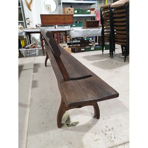 129 - A vintage pine bench with a reversable back rest, width 95.5